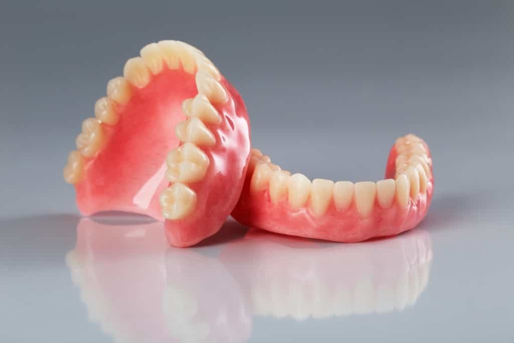 set of false teeth for article about the All-On-4 dental implant procedure 